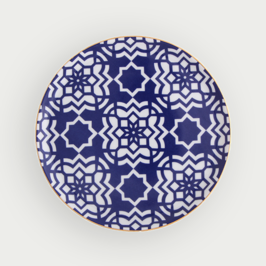 Assiette plate de 20cm aux motifs or, inspirée de l'éclat et l'authenticité du Maroc, parfaite pour la décoration des maisons.