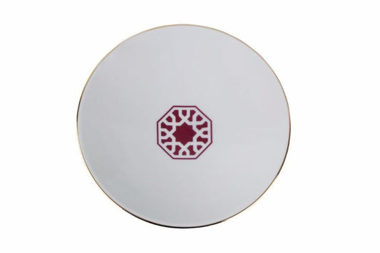 Assiette creuse en porcelaine de 20cm aux motifs bordeaux évoquant l'éclat et l'authenticité de la décoration marocaine.