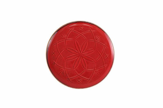 Assiette rouge à reliefs de 18 cm inspirée de l'éclat du Maroc, alliant modernité et authenticité dans la décoration des maisons.