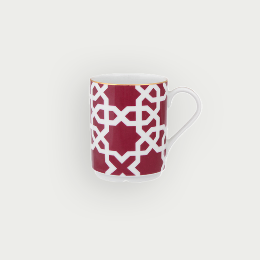 Mug en porcelaine avec motifs or véritable inspirés de l'authenticité marocaine, évoquant une atmosphère chaleureuse pour la décoration de maisons.