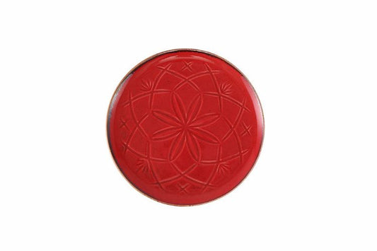 Assiette rouge à reliefs de 18 cm inspirée de l'éclat du Maroc, alliant modernité et authenticité dans la décoration des maisons.