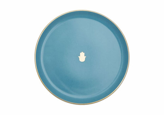 Assiette plate turquoise de 20 cm avec motifs ethniques, rappelant l'authenticité du Maroc, conçue pour une atmosphère brillante en décoration de maisons.