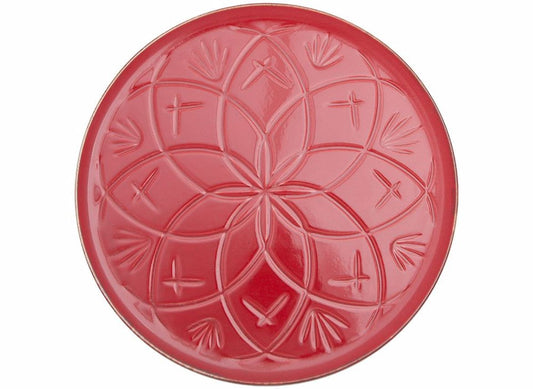 assiette rouge a reliefs evoquant une atmosphere dauthenticite et d'eclat inspirée de la decoration des maisons du Maroc