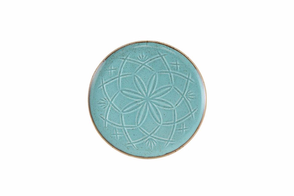 Une assiette turquoise à reliefs de 18cm refletant lauthenticite de la tradition marocaine tout en apportant un eclat moderne à la decoration des maisons